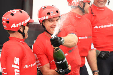 Curtis Blewett (C) and Morgan Trubovich (L) of Artemis Racing celebrate in style after winning the Venice Match Race Final. celebrate in style after winning the Venice Match Race Final. Photo:2012 ACEA/Gilles Martin-Raget